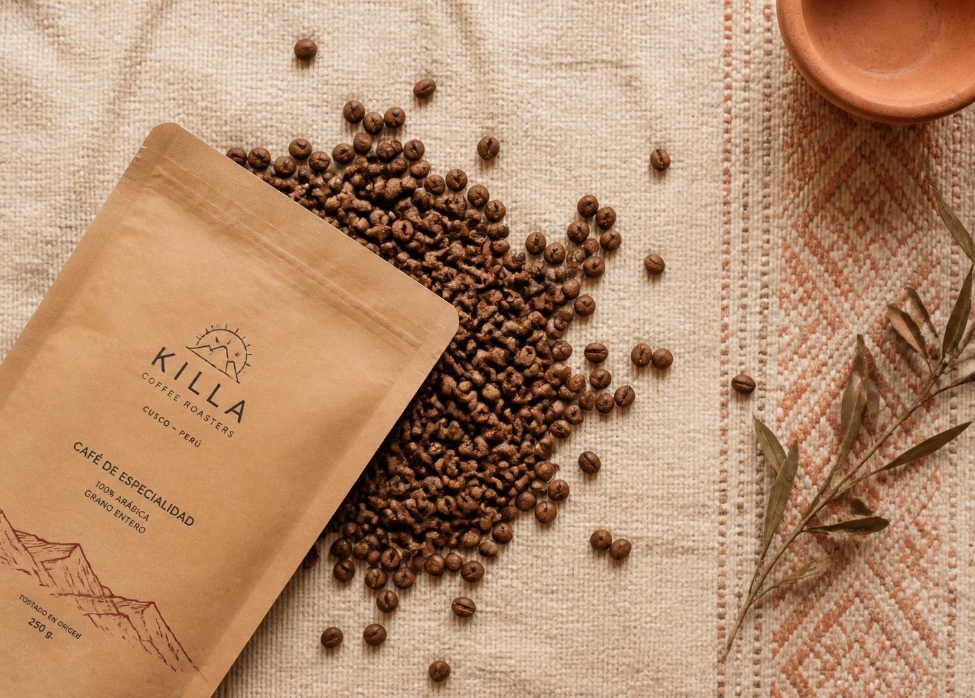 Peruvian specialty coffee beans spilling onto woven textile
